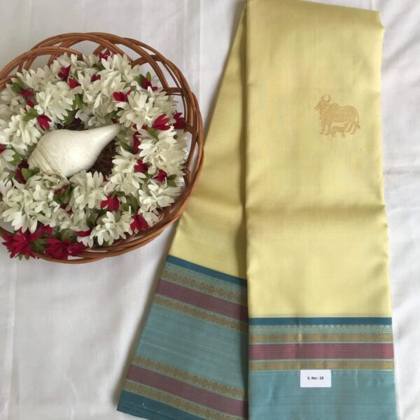 Kanchipuram silk saree with rettaipet border  &thread work